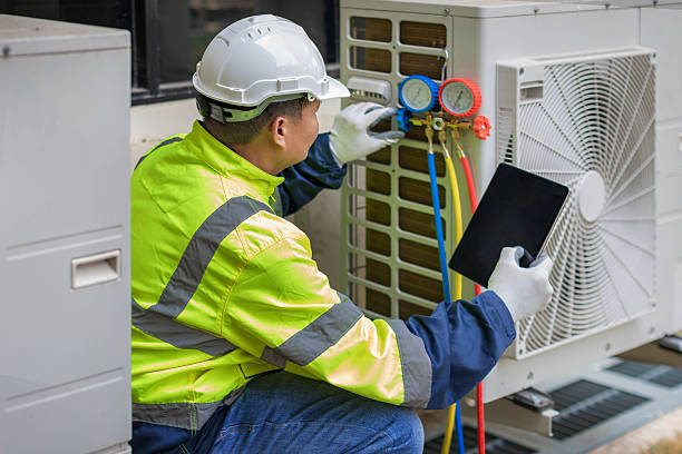 Professional Heat Pump Repair technician working in Lynnville, TN
